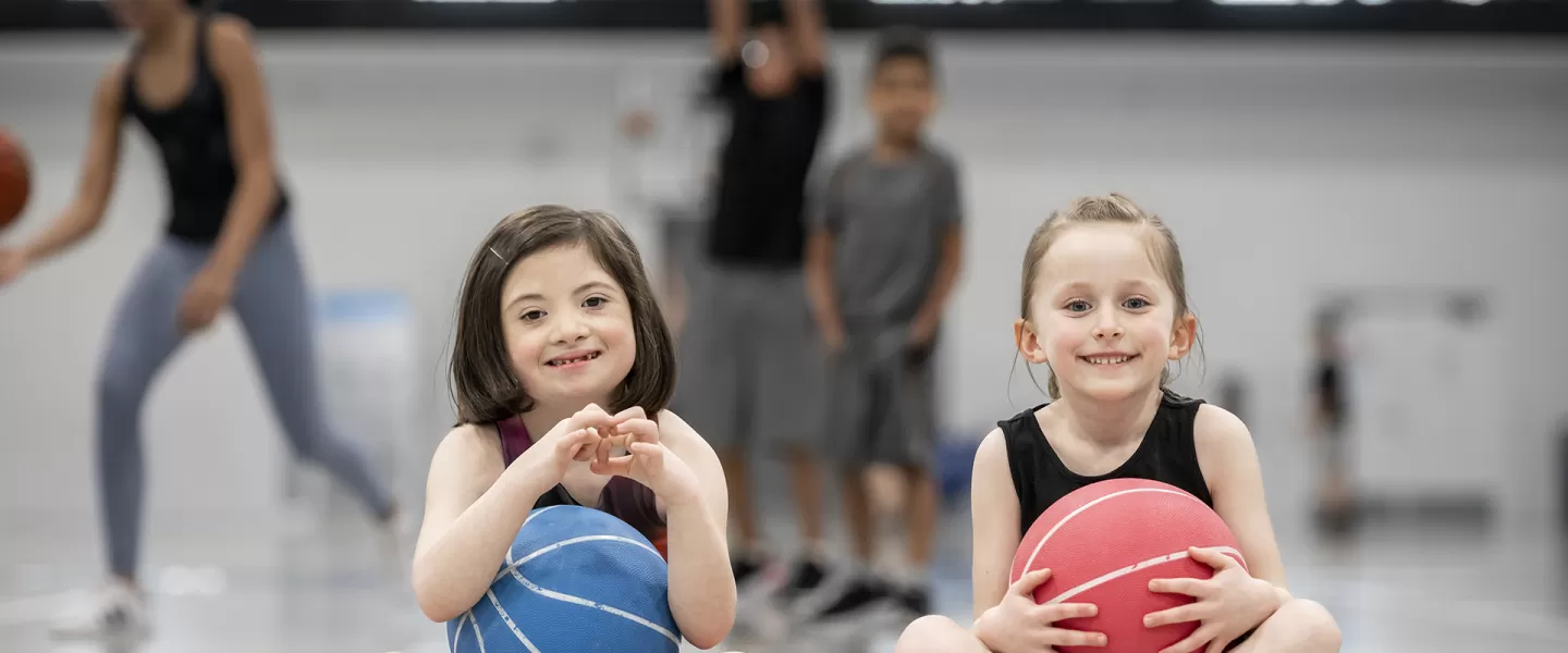 young girls playing in gymnasium