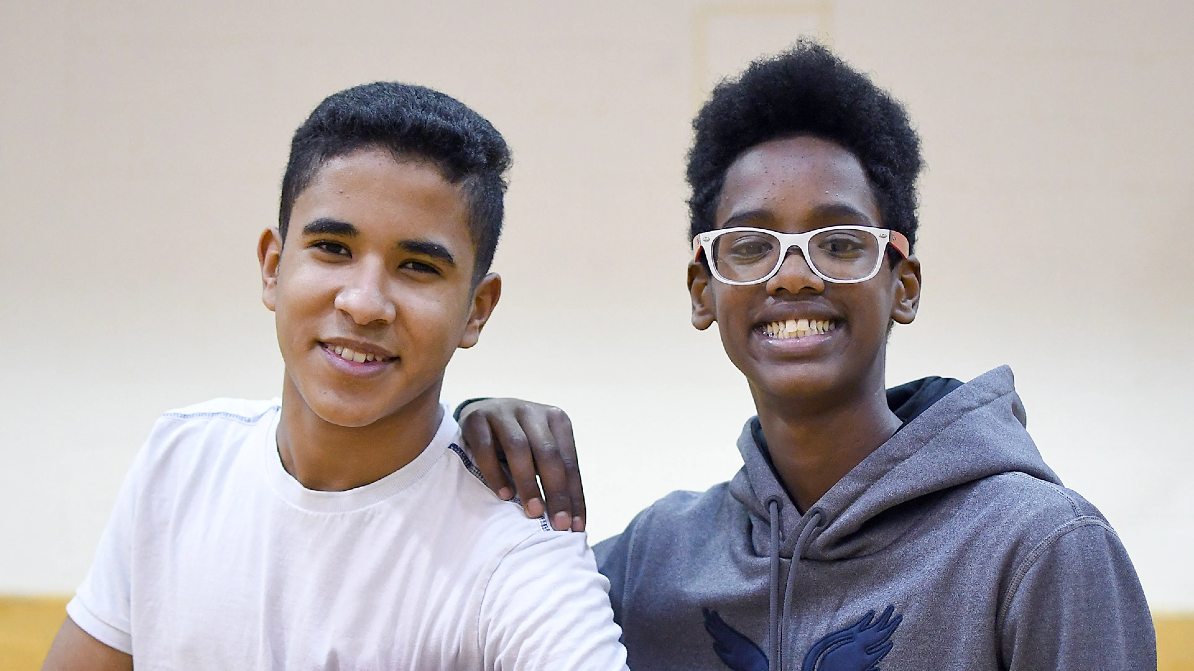 youth boys smiling in gymnasium