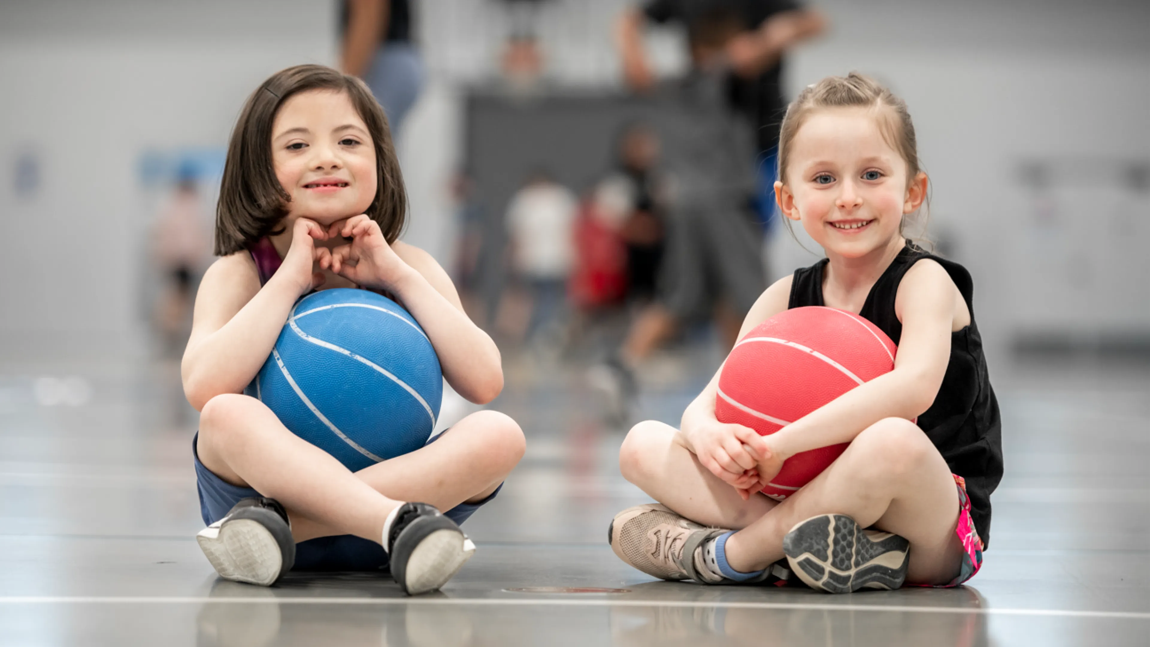young girls playing in gymnasium