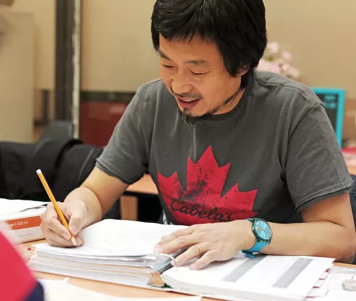 tutor working with student