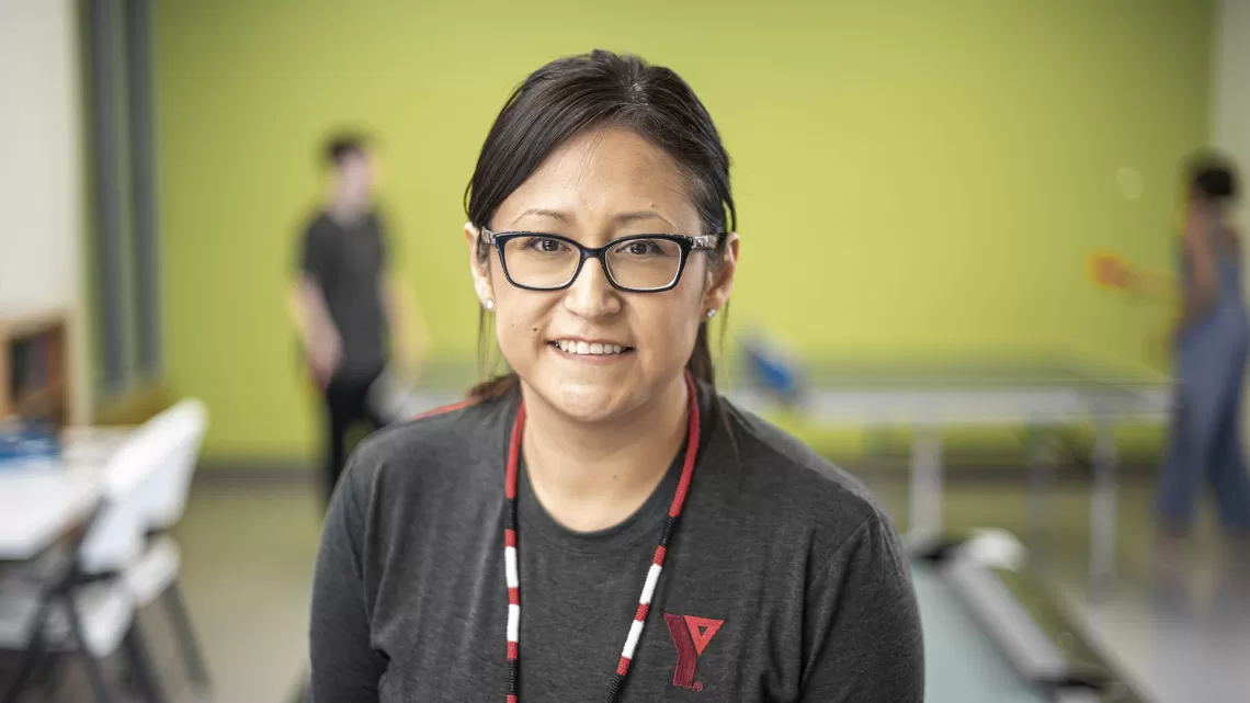 YMCA employee smiling