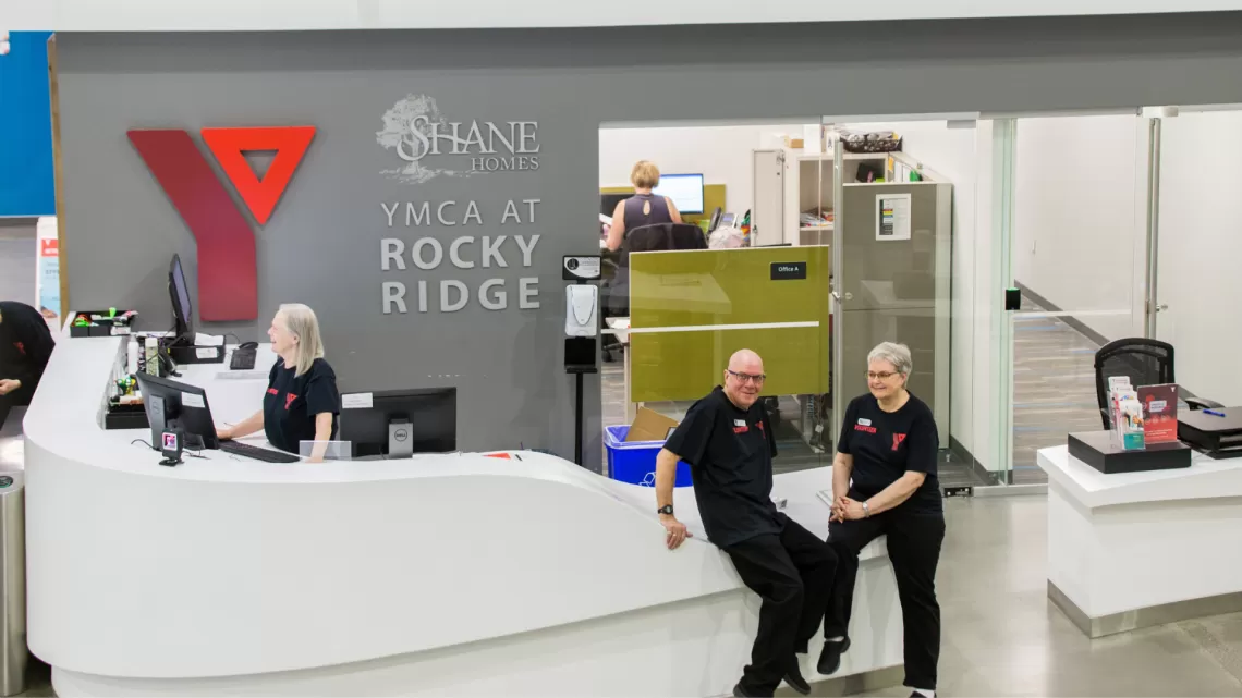 3 volunteers at gate at ROY