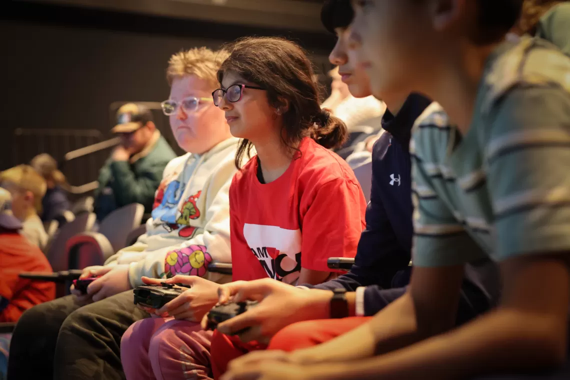group of youth playing video games