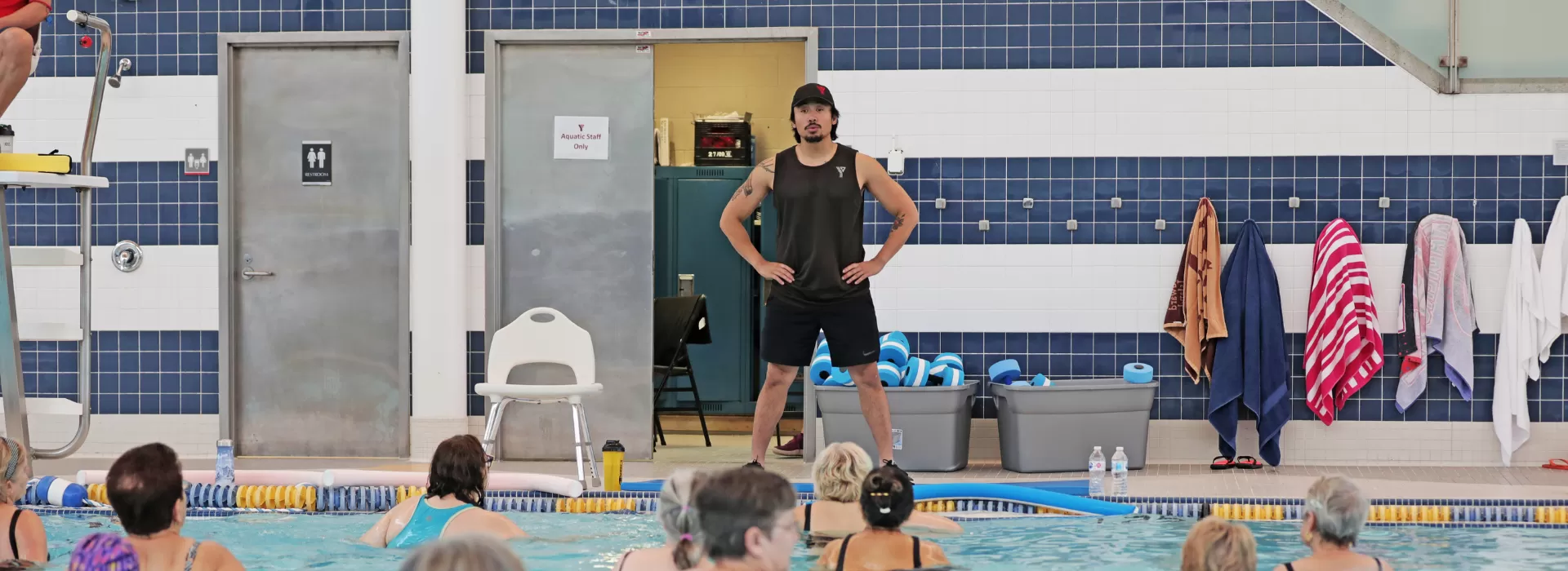 man teaching aquafit