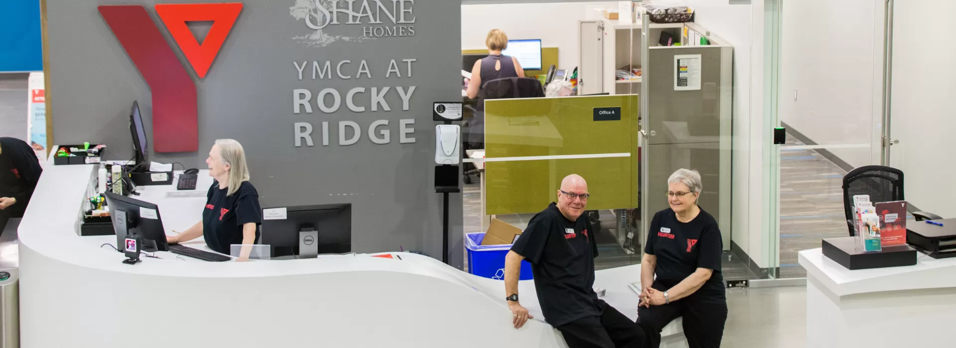 3 volunteers at gate at ROY